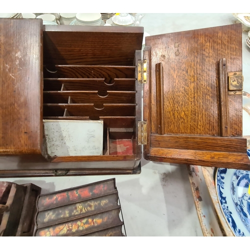 320 - An oak Stationery Box with hinged sloping front, a Huntley & Palmers Biscuit Tin in the form of Book... 