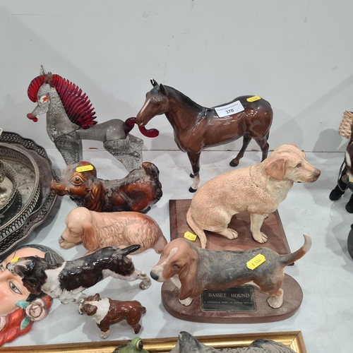 370 - A collection of ceramic ornaments and figurines including, Beswick Fox, Beswick Arnoldene Dalmation,... 