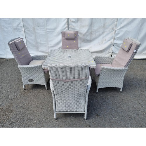 46 - A garden table and four chairs with woven design, table A/F