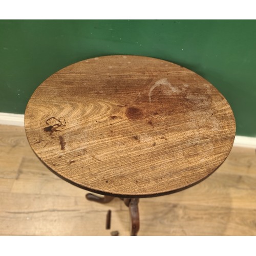 130A - A 19th Century mahogany tilt-top Table on turned column and tripod base, 2ft 1in Diam, A/F