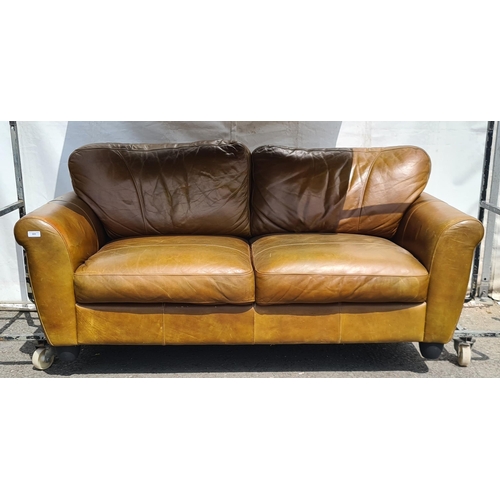 838 - A leather effect two seater Settee