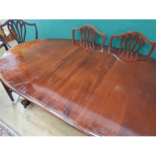 485 - A Victorian mahogany oval extending Dining Table with spare leaf and winder, raised on carved cabrio... 