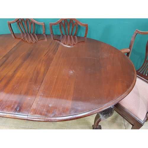 485 - A Victorian mahogany oval extending Dining Table with spare leaf and winder, raised on carved cabrio... 