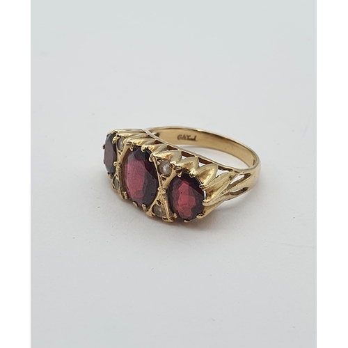 163 - A Garnet three stone Ring pavé-set oval-cut stones in 9ct gold, ring size M, approx 3.80gms