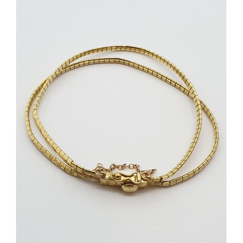 178 - A two strand engraved flexible link gold Bracelet stamped 750, approx 15gms