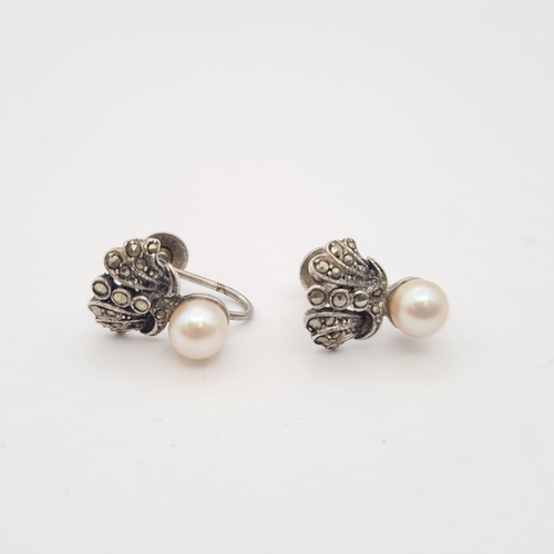 180 - A pair of Cultured Pearl and Marcasite Earrings in silver, on screw fittings