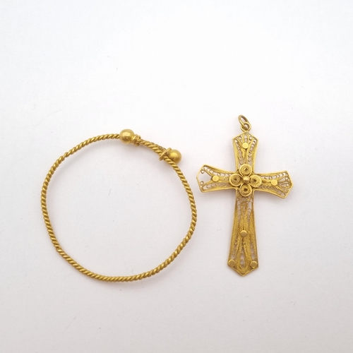 191 - A yellow metal filigree Cross set garnet and a yellow metal child's Christening Bracelet, possibly C... 