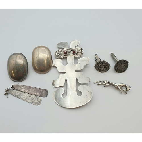 197 - A large pair of silver Butler & Wilson Earrings, a large 1970's Brooch, coin set Cufflinks etc