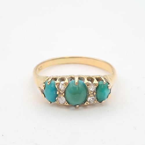 204 - A Turquoise and Diamond Ring set three graduated oval turquoise cabochons with rose-cut diamonds bet... 