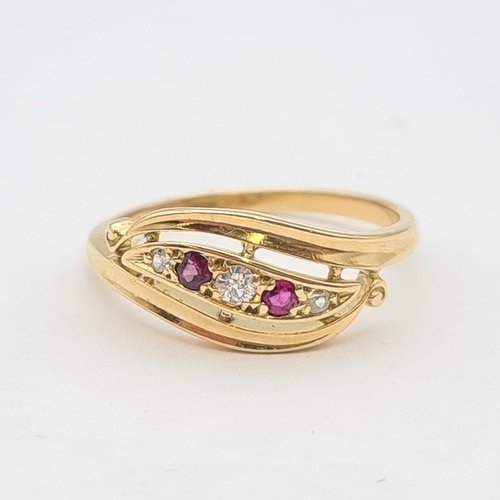 209 - A Diamond, Garnet and Ruby Ring pavé-set three old-cut diamonds interspersed with round ruby and gar... 