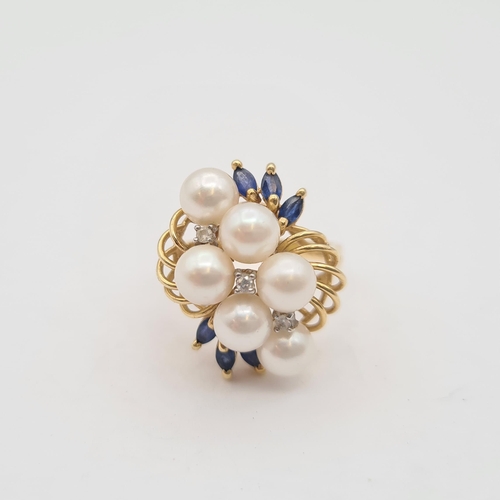 214 - A Diamond, Cultured Pearl and Sapphire Cocktail Ring in 14ct gold, ring size M, approx 5.60gms