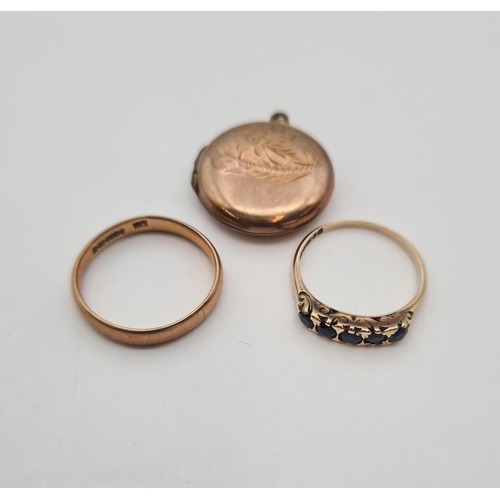 220 - A 9ct gold Wedding Band, a Sapphire five stone Ring set round stones, ring size M and a round Locket... 