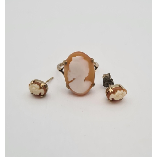 221 - A carved shell Cameo Ring of bust in profile, stamped 9ct, ring size L 1/2 and a pair of carved shel... 