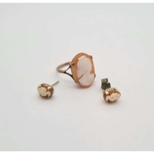 221 - A carved shell Cameo Ring of bust in profile, stamped 9ct, ring size L 1/2 and a pair of carved shel... 