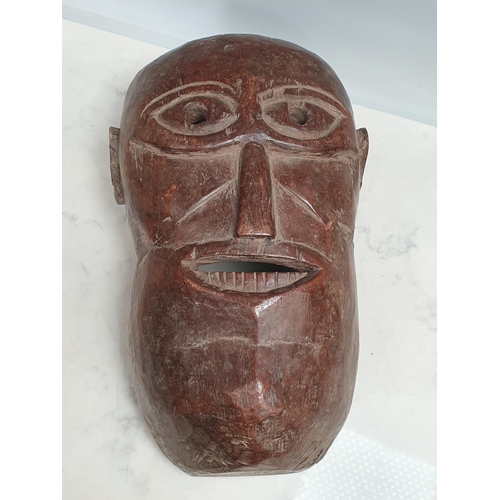 393 - An antique carved East African Ceremonial Mask 11 1/2in