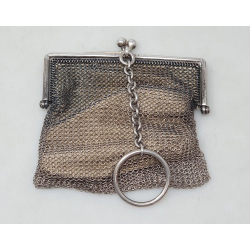 104 - A George V silver small Mesh Purse, Birmingham 1923, and another, larger, the clasp set blue cabocho... 