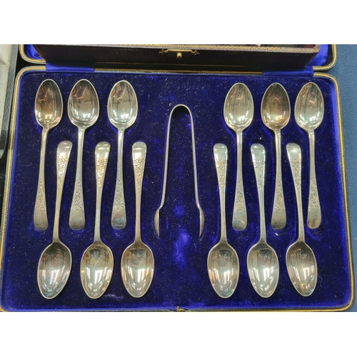 115 - A set of one dozen plated Teaspoons and Sugar Tongs, pair of Fish Servers, Fish eaters, pair of Serv... 