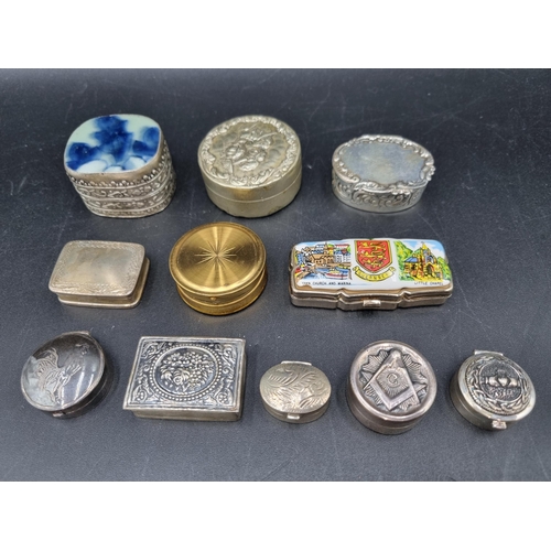 117 - A Collection of eleven various Pill Boxes in silver, white metal, gilt metal, etc