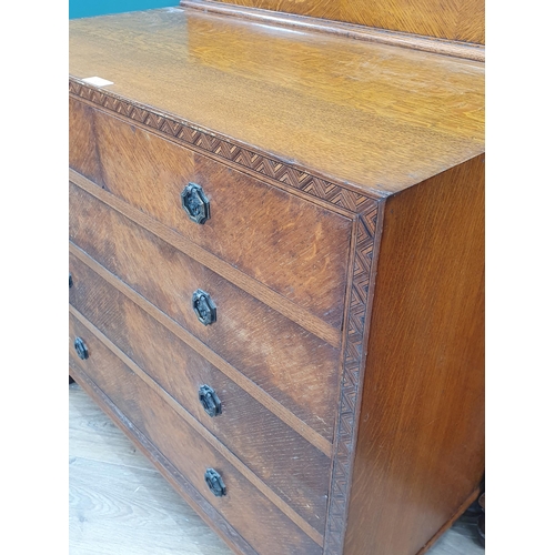 12 - An oak Chest of two short and three long drawers surrounded by parquetry inlay, 3ft W, and a matchin... 