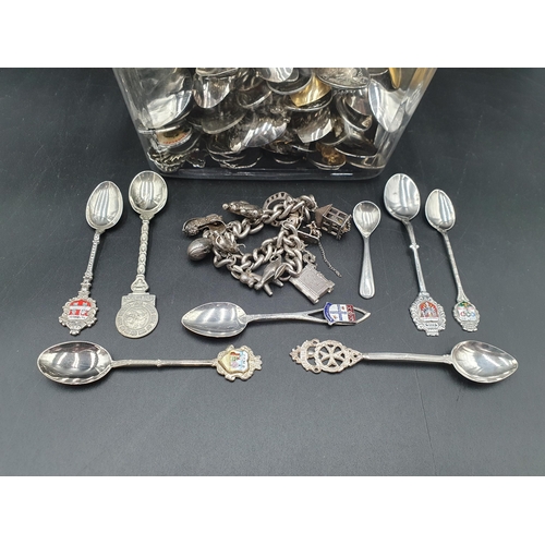 126 - A silver \charm Bracelet with numerous charms, a silver salt Spoon, and a quantity of Continental si... 