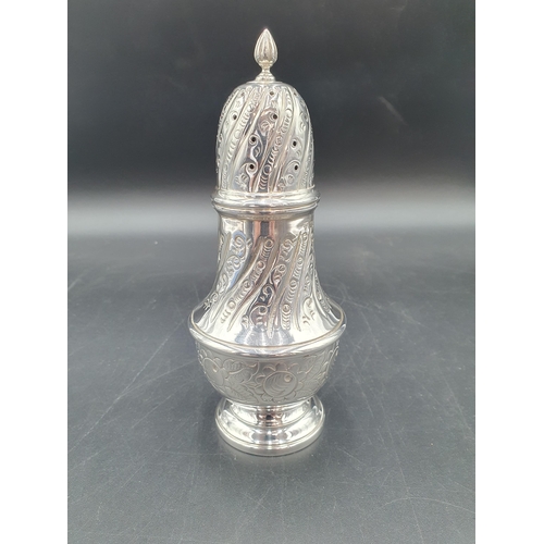 140 - An Elizabeth II silver Sugar Caster with spiral embossing, London 1976