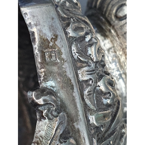 143 - A Continental silver Centre Piece with two handled vase surmount, leafage embossed, 6 1/2in, A/F, an... 