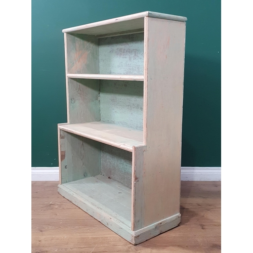 19 - A small green painted pine open waterfall Bookcase on plinth base, 3ft 4in H x 2ft 7in W, (R7)