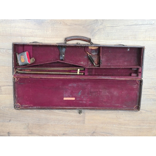 2 - A leather covered Gun Case with fitted interior 2ft 8in W (R2)