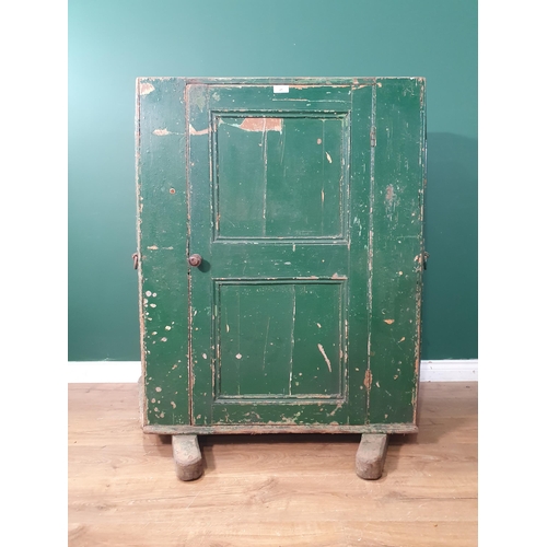 21 - A 19th Century green painted Huffer, fitted single panel door enclosing metal lined shelves with ope... 