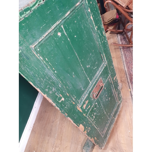 21 - A 19th Century green painted Huffer, fitted single panel door enclosing metal lined shelves with ope... 