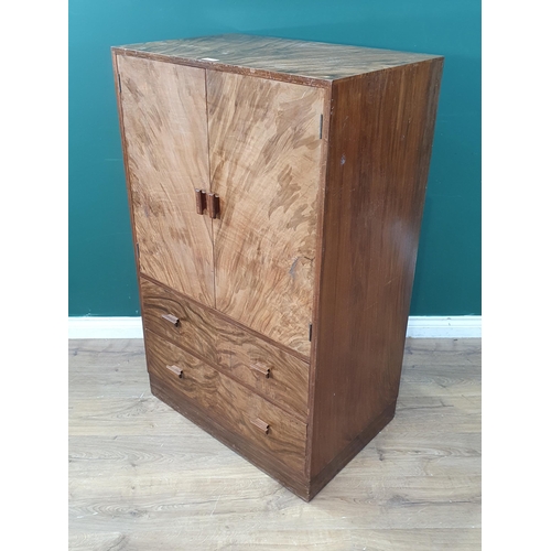 22 - A Heals walnut Art Deco Tallboy with inset ivorine makers disc to top drawer, A/F, 4ft High x 2ft 6