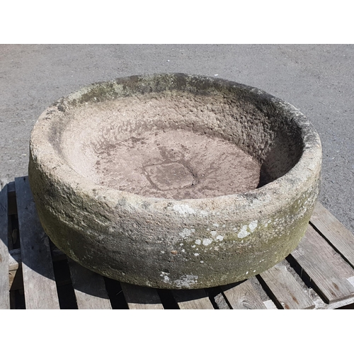 257 - A large hollowed out Mill Stone, 2ft 11