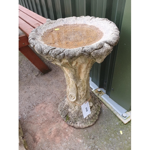 259 - A Composite Birdbath with tree trunk and bird designs, 2ft 3