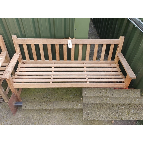 266 - A Teak three seater Garden Bench, 61