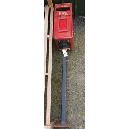 267 - A Royal Mail ER Post Box with Key mounted on black metal stand, 5ft 4