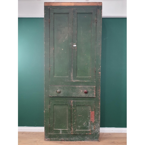 27 - A 19th Century green painted Welsh Food/Larder Cupboard, having a pair of panelled doors enclosing s... 