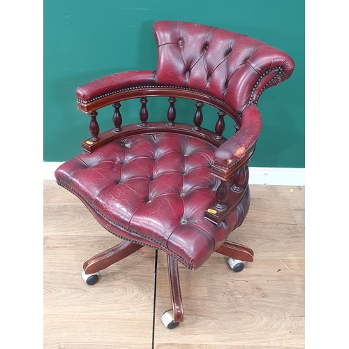 283 - A modern reproduction button upholstered Swivel Office Chair. (R10).