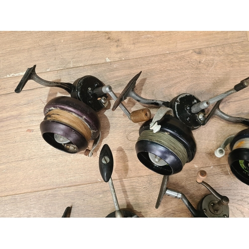 3 - A Luxor fixed spool beach casting Reel, four Super 87 fixed spool beach casting Reels, a closed face... 