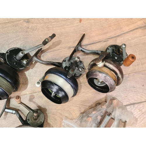 3 - A Luxor fixed spool beach casting Reel, four Super 87 fixed spool beach casting Reels, a closed face... 