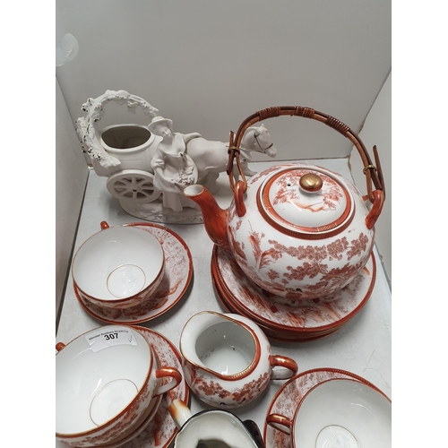 307 - A hand painted Tea Service including, Teapot, Six Cups and Saucers, Sugar Bowl and Milk Jug made in ... 