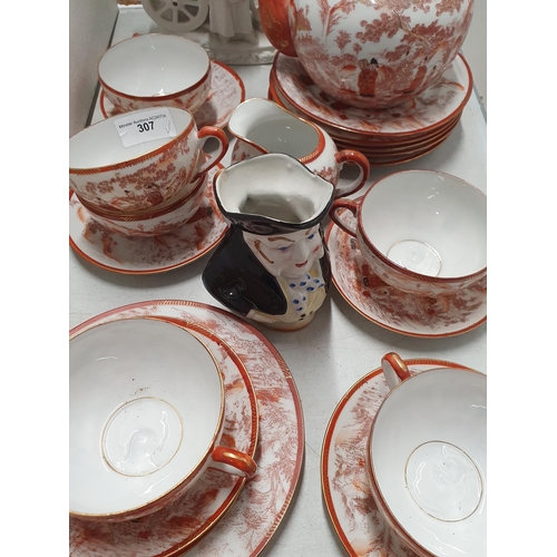 307 - A hand painted Tea Service including, Teapot, Six Cups and Saucers, Sugar Bowl and Milk Jug made in ... 