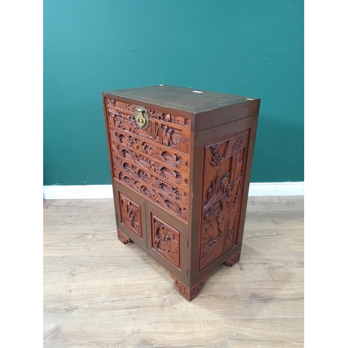 31 - A Chinese carved hardwood Cutlery Stand with hinged top and with fitted drawers and pair of cupboard... 