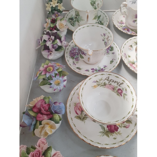 310 - Twelve Royal Albert Flower of the Month series Cups and and Saucers and a collection of Royal Albert... 