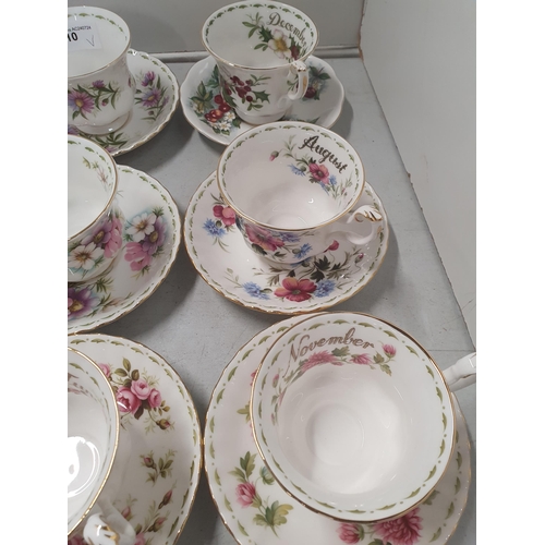 310 - Twelve Royal Albert Flower of the Month series Cups and and Saucers and a collection of Royal Albert... 