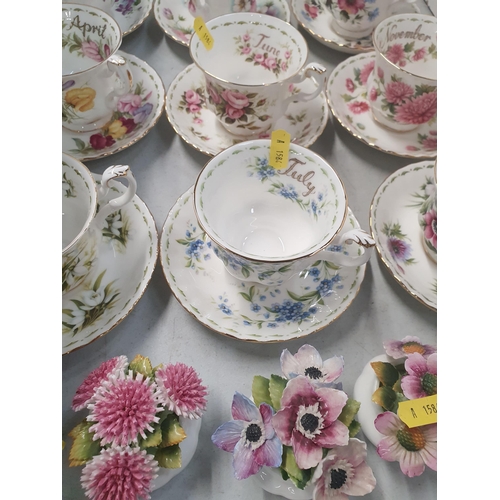 310 - Twelve Royal Albert Flower of the Month series Cups and and Saucers and a collection of Royal Albert... 