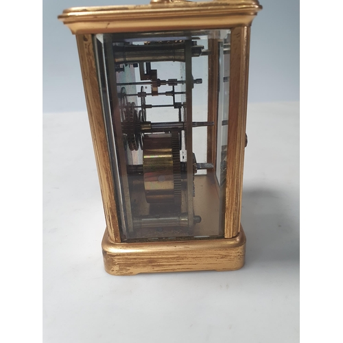 341 - Four various brass-cased Carriage Clocks and a Siemens Bros brass cased Compass, 3 1/2in diam, (R5)