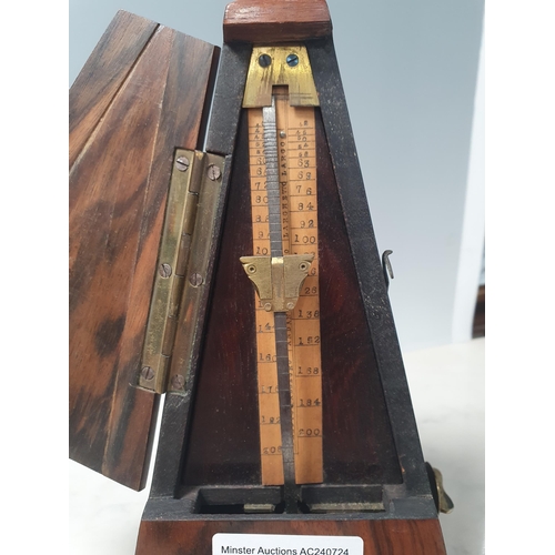 342 - A walnut cased Metronome and a large pair of Field Binoculars in case, (R5)