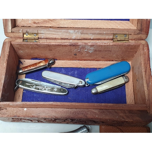 356 - Two carved hardwood Boxes containing a collection of assorted Pocket Knives including two silver cas... 