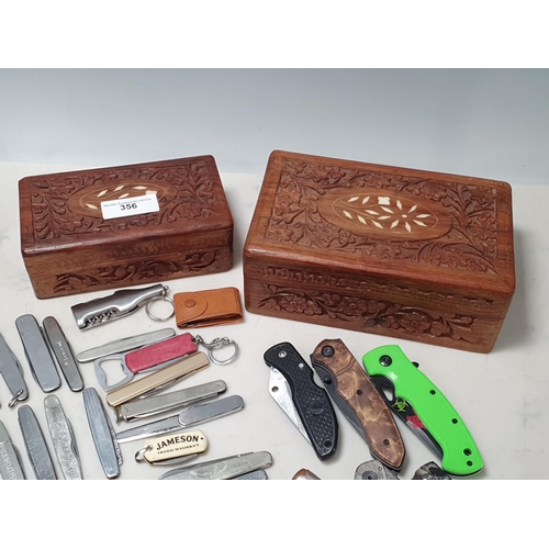 356 - Two carved hardwood Boxes containing a collection of assorted Pocket Knives including two silver cas... 