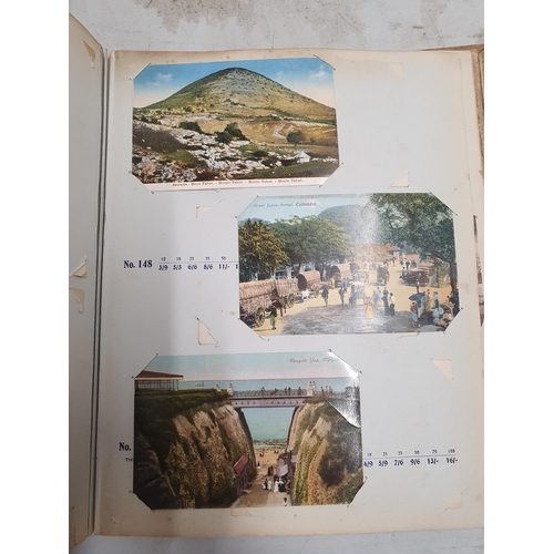 381 - An Album 'The Classic Series' containing various black and white and colour Postcards, including Fir... 